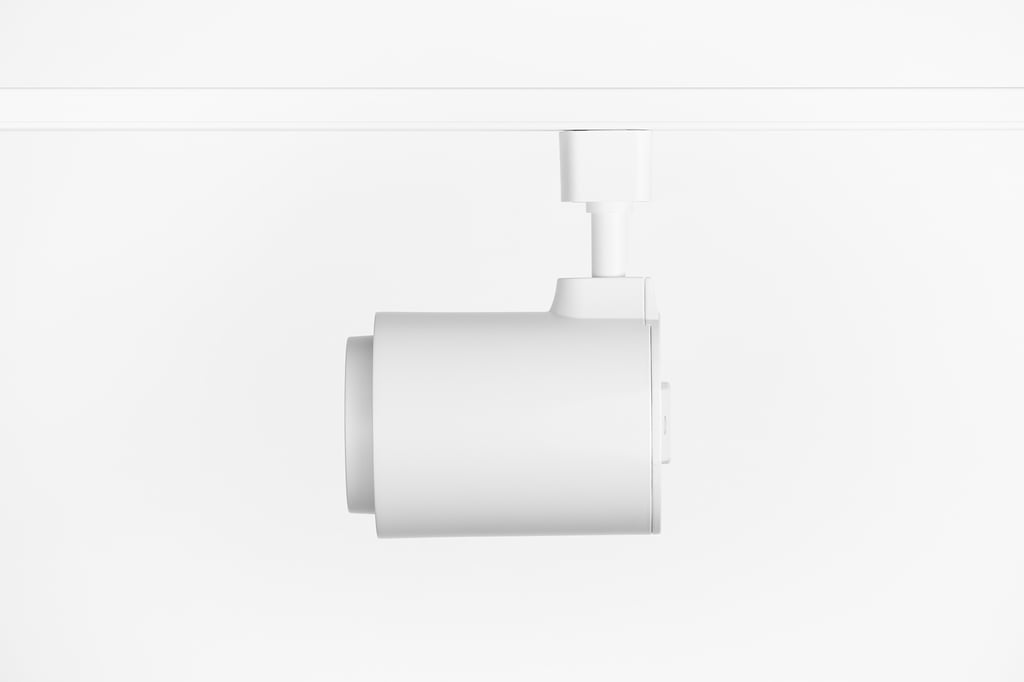 Black modern track lighting adding architectural contrast in Washington kitchen