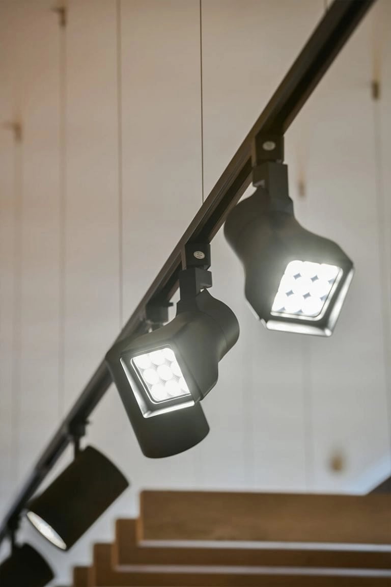 Expert advice on suspended track lighting for vaulted ceilings in Florida interiors